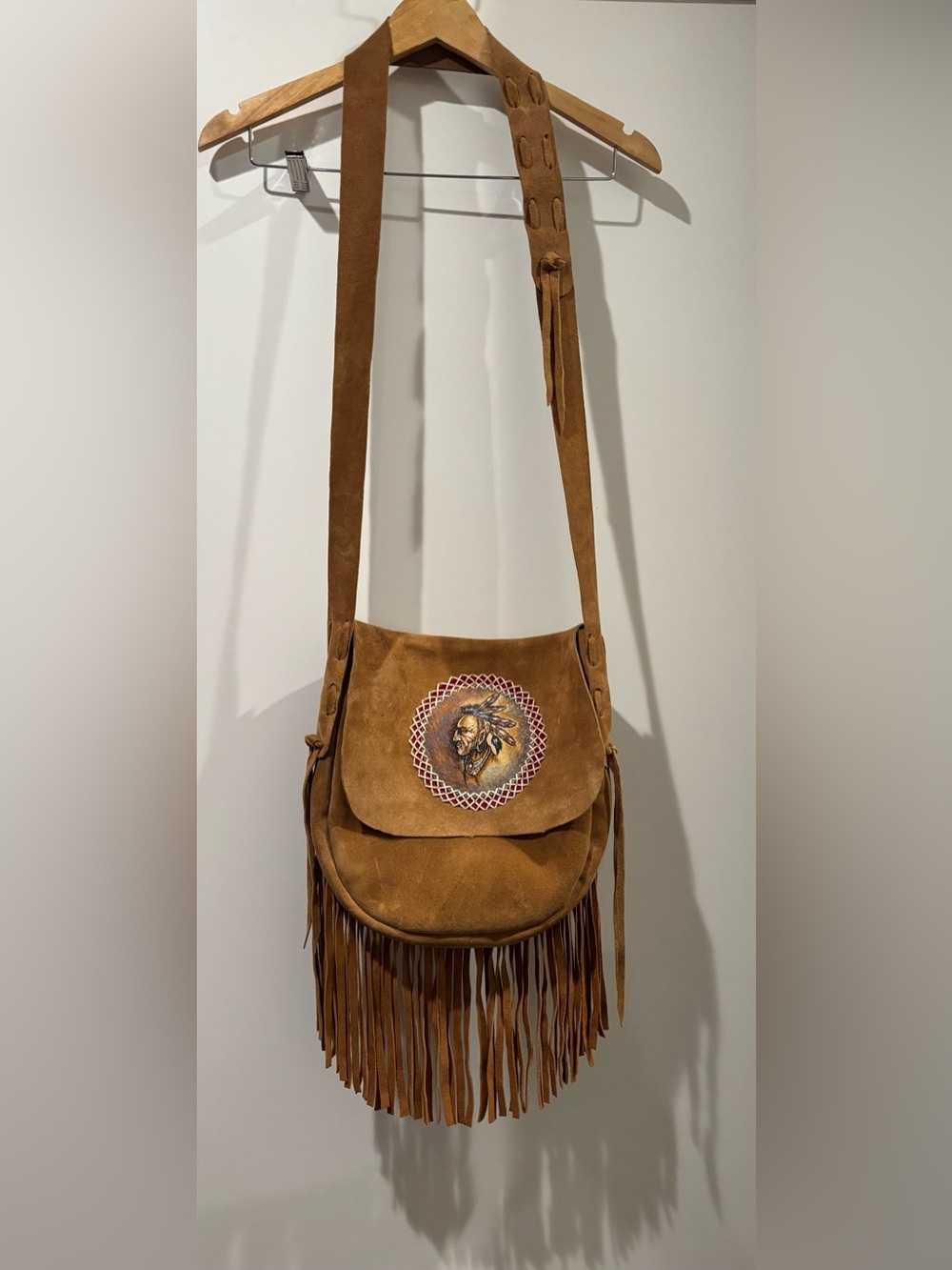 Vintage suede crossbody bag with Native American Chief on flap as new condition